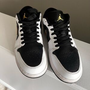 Jordan Air 1 Low in Black and Metallic Gold